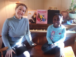 Piano Teacher and Student